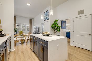 Waterfall quartz countertops or granite in select homes